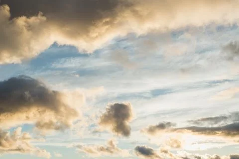 Clouds at sunset Stock Photos