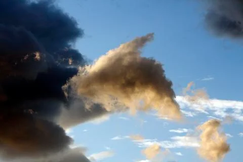 Clouds at sunset Stock Photos