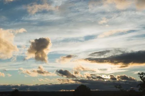 Clouds at sunset Stock Photos