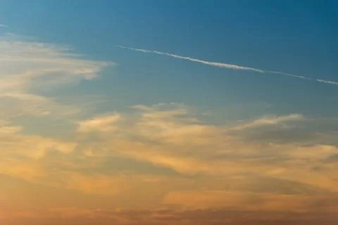 Clouds at sunset Stock Photos