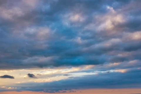 Clouds at sunset Stock Photos