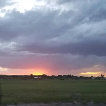 Clouds at sunset Stock Photos