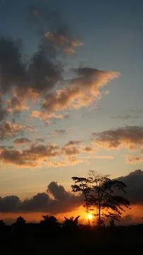 Clouds at sunset Stock Photos