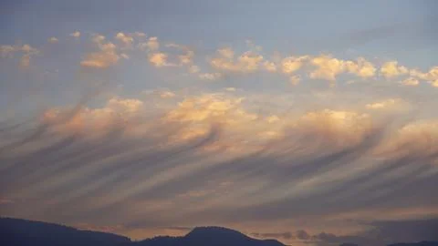 Clouds at sunset Stock Photos