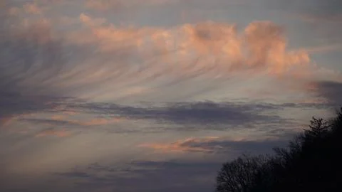 Clouds at sunset Stock Photos
