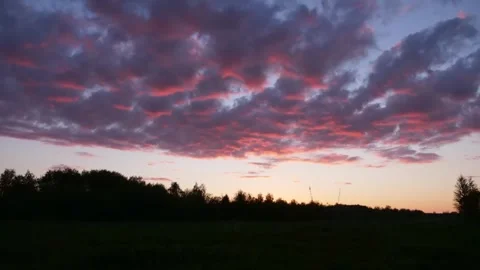Clouds in the sunset in Siberian taiga. Timelapse Stock Footage 282054018
