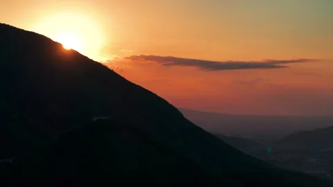 Clouds with sunset sky background in mounts , background Dark red purple sunset  Stock Footage 248780890