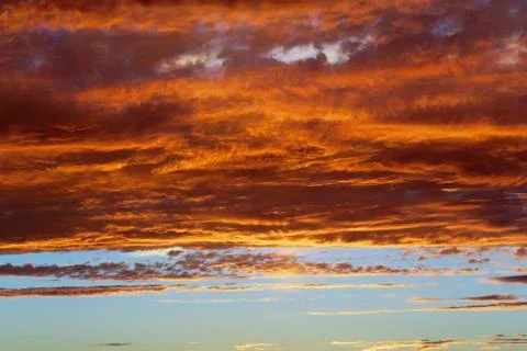 Clouds on sunset sky, background Stock Photos