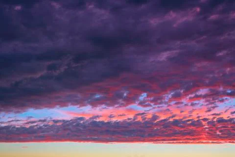 Clouds on sunset sky, background Stock Photos