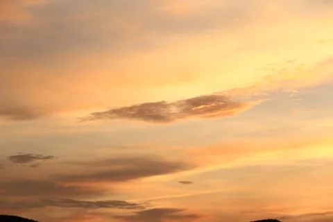 Clouds in the sunset sky Stock Photos