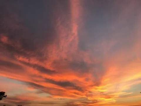 Clouds in the sunset sky Stock Photos