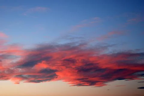 Clouds on sunset sky Stock Photos