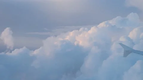Clouds in the sunset viewed from the airplane window Stock Footage 140460286