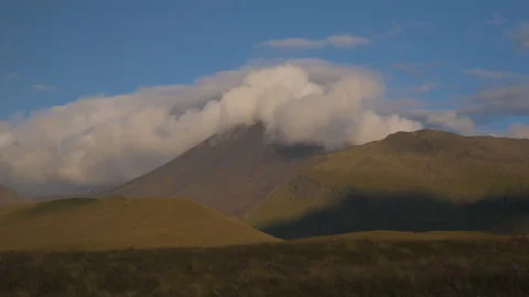 The clouds surrounding the summit of Mount Tongariro, in New Zealand Stock Footage 219965080