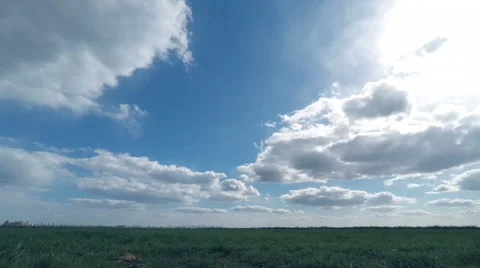Clouds Sweep Over the Green Field Stock Footage 49743220