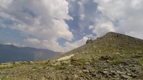 Clouds swirling across Mountains. Stock Footage
