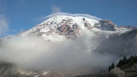 Clouds Swirling at the Snowy Summit of Mount Rainier, 4K Stock Footage 164389819
