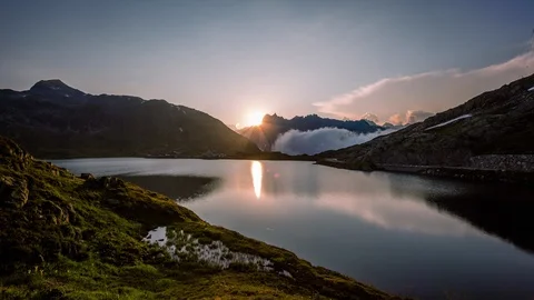 Clouds taking over Totensee in Grimsel, Grimselpass time lapse Vídeo Stock 119057625