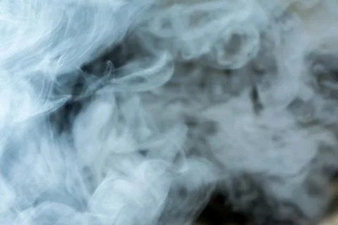 Clouds of thick smoke, blurred abstract background Stock Photos
