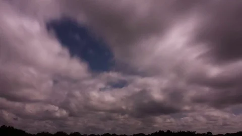 Clouds Thinning to Reveal Blue Sky (1080p 23.976) Stock Footage 81097195