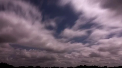Clouds Thinning to Reveal Blue Sky (1080p 29.97) Stock Footage 81097196