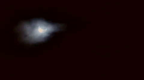 Clouds Threaten to Blot Out 2014 Partial Solar Eclipse 4K Stock Footage 54717232