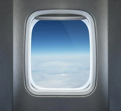 Clouds through te airplane window Stock Photos