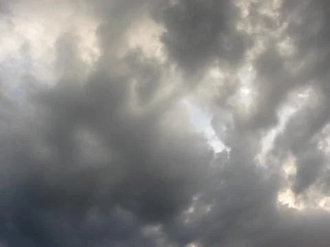 Clouds before a thunder-storm in the sky as a background. Stock Photos