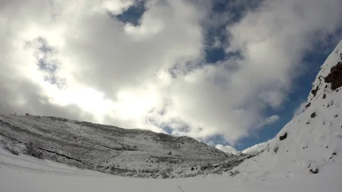 Clouds time laps on snow mountain Stock-Footage 129689179