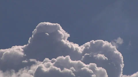 Clouds time lapse-1, roiling cumulus nimbus under blue sky Stock Footage 39581766