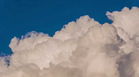 Clouds time lapse of billowing clouds moving across sky Stock Footage 31808836