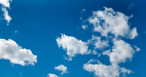 CLOUDS TIME LAPSE, BUILDING MOTION CLOUD WITH BLUE SKY. Stock Footage 110365209