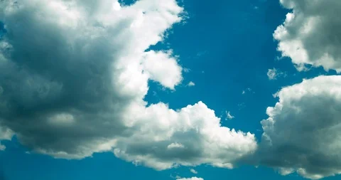 CLOUDS TIME LAPSE, BUILDING MOTION CLOUD WITH BLUE SKY. Stock Footage 110967480