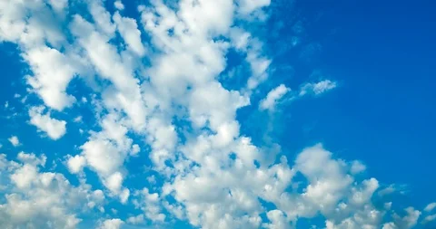 CLOUDS TIME LAPSE, BUILDING MOTION CLOUD WITH BLUE SKY. Stock Footage 111843750