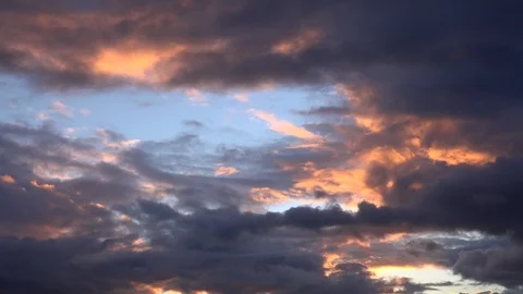 Clouds time lapse from dark to light blue sky depression lifting 4K Stock-Footage 101140548