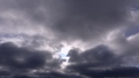 Clouds time lapse from dark to light blue sky depression lifting 4K 스톡 동영상 101771404