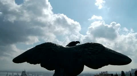 Clouds Time Lapse with eagle statue in forground Stock Footage 11118898