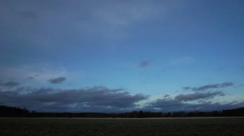 Clouds time lapse at field. Spooky feeling Stockbeeldmateriaal 45247297