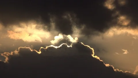 Clouds time lapse golden light 4K Stock Footage 125484249