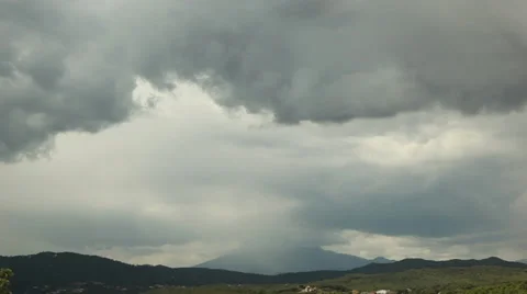 Clouds Time Lapse with Mountain Stock Footage 38918280