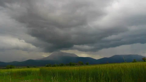 Clouds time lapse mountain rain Stock Footage 63850890