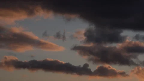 Clouds time lapse moving in dark sky 4K Stock Footage 147968362