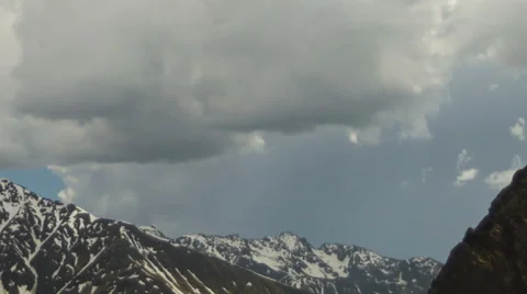 Clouds time lapse over alpine landscape Stock Footage 64962298