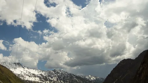 Clouds time lapse over alpine landscape Stock Footage 64966776