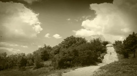 Clouds Time Lapse over country road: old film footage 스톡 동영상 27969016