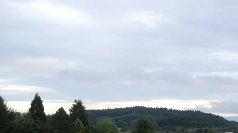 Clouds Time Lapse Over a Mountain with Trees Stock Footage 882918
