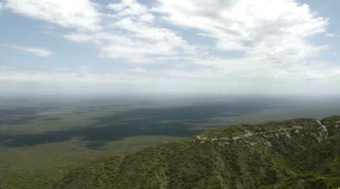Clouds Time-Lapse over a mountain &amp; valley. 4k. Stock Footage 23553915
