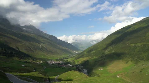 Clouds time lapse over a mountain valley at the Swiss Alps, Switzerland. Furka Stock Footage 161869081