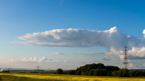 Clouds time lapse over rural landscape Stockbeeldmateriaal 64998856