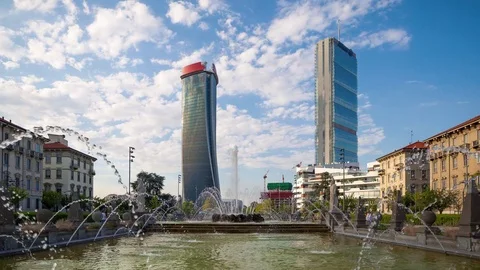 Clouds time lapse over the skyscrapers towers of Milan Citylife Stock Footage 92964571